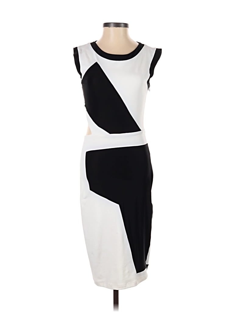 Click to view more detailed imagery on our partner's website Pre-owned Bebe Cocktail Dress In White