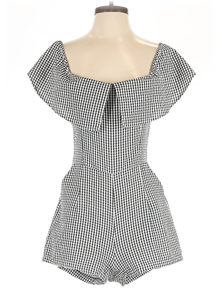 Click to view more detailed imagery on our partner's website Pre-owned Three Days Romper In White