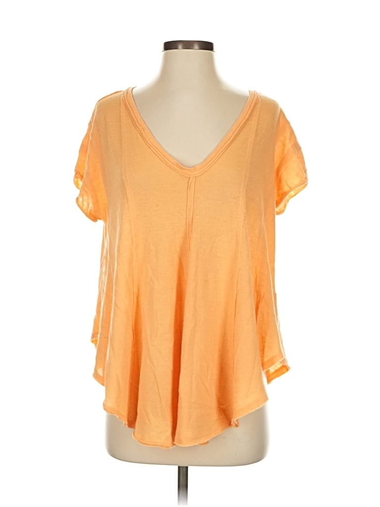Click to view more detailed imagery on our partner's website Pre-owned We The Free Short Sleeve Top Orange V Neck Tops