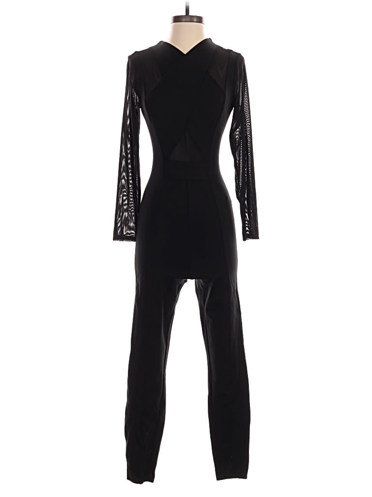 Pre-owned Bebe Jumpsuit In Black