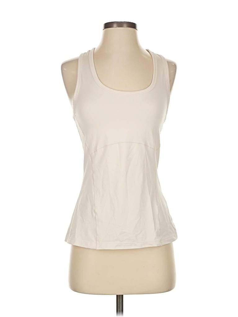 Click to view more detailed imagery on our partner's website Pre-owned Fabletics Tank Top Ivory Halter Neckline Tops In White