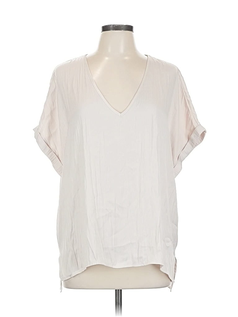 Click to view more detailed imagery on our partner's website Pre-owned By Together Short Sleeve Blouse In White