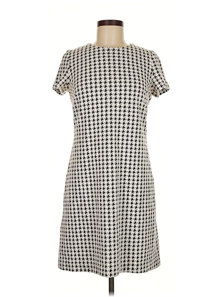 Click to view more detailed imagery on our partner's website Pre-owned Calvin Klein Casual Dress In White