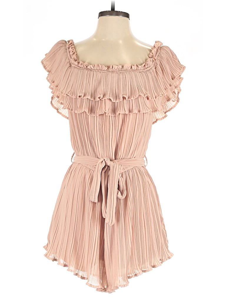Click to view more detailed imagery on our partner's website Pre-owned She + Sky Romper In Pink