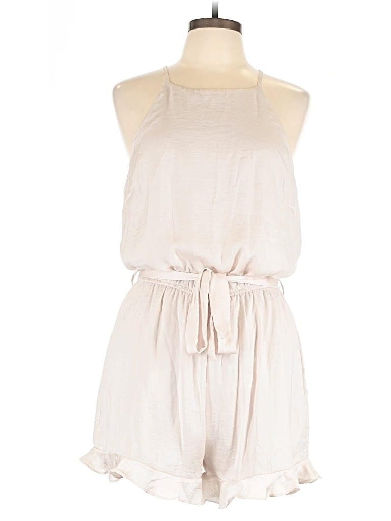 Click to view more detailed imagery on our partner's website Pre-owned She + Sky Romper In White