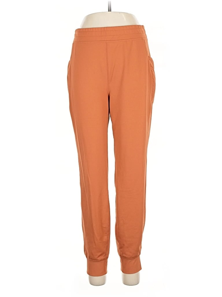 Pre-owned Fabletics Casual Pants In Orange