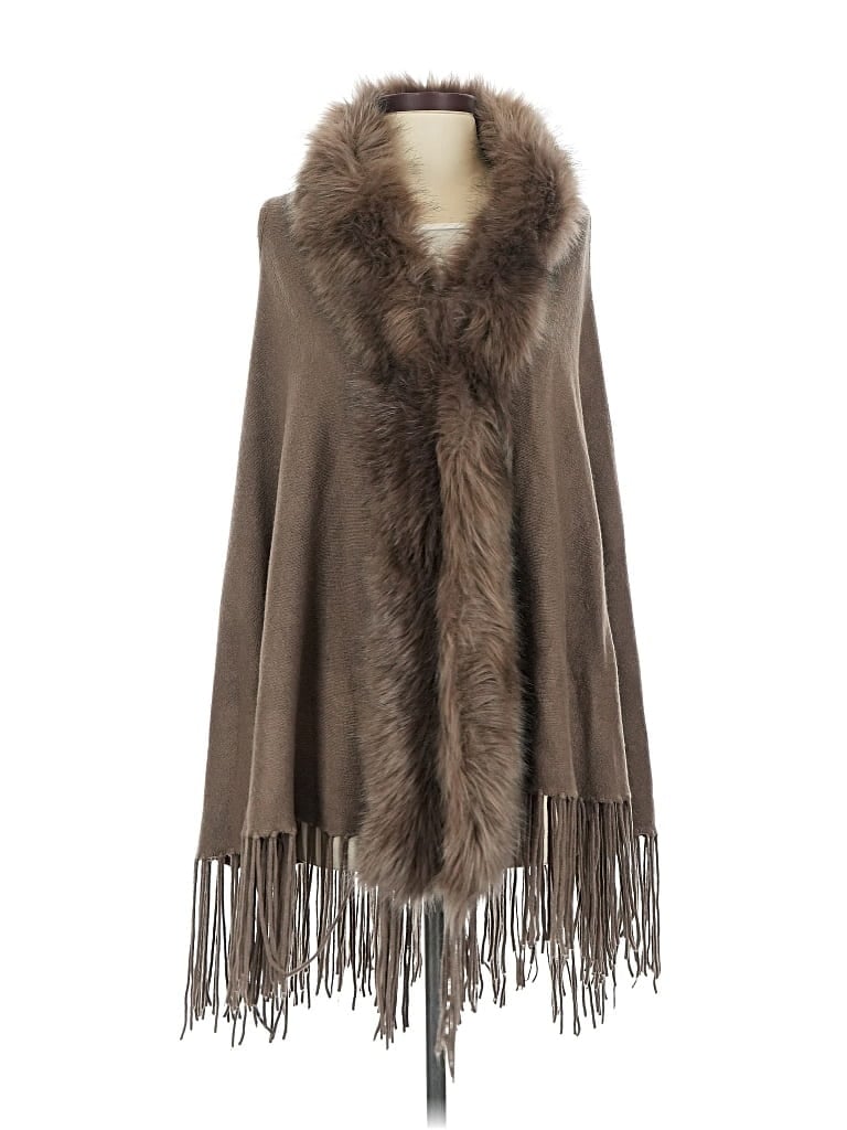 METRIC KNITS Pre-owned Poncho In Blue