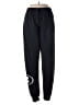 Under Armour Solid Black Track Pants Size M - photo 1