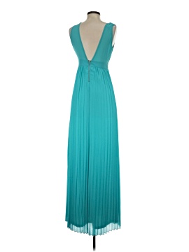 knee length dresses for ladies Free People Brown Ribbed Maxi Dress with Low Open Back and Dramatic Ti   The Thrifty Hippy