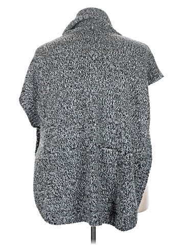Woman Within Poncho (view 2)