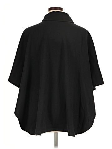 Woman Within Poncho (view 2)