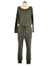 Express Solid Green Jumpsuit Size M - photo 1
