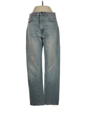 Totême Twisted Seam Distressed Jeans (view 1)