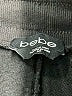 Bebe Animal Print Black Casual Pants Size S - photo 7