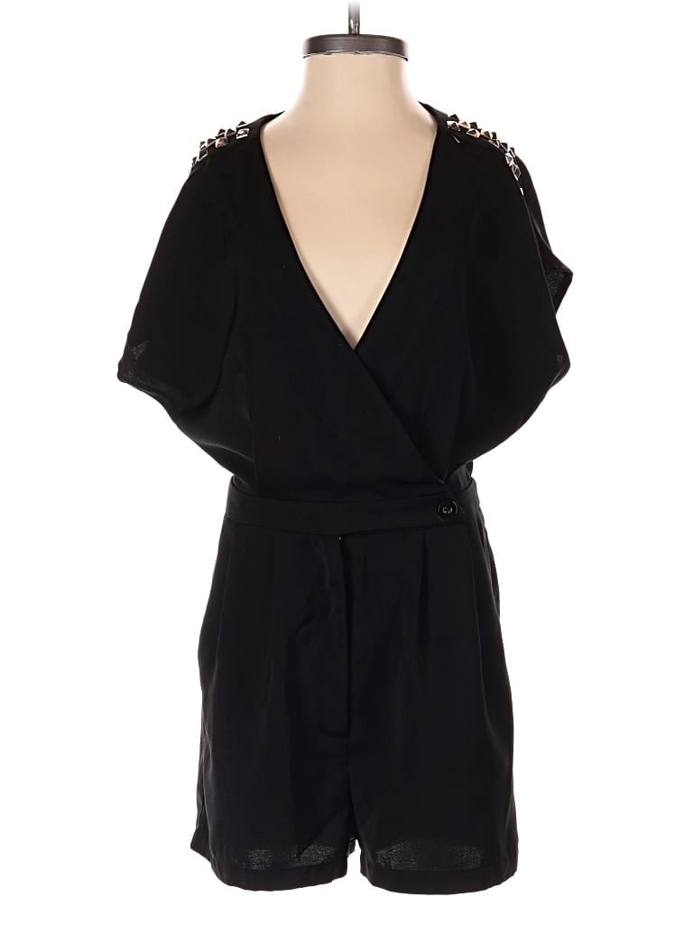 Click to view more detailed imagery on our partner's website Pre-owned Silence And Noise Romper In Black