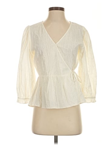 Madewell Embroidered Eyelet Puff-Sleeve Peplum Wrap Top (view 1)