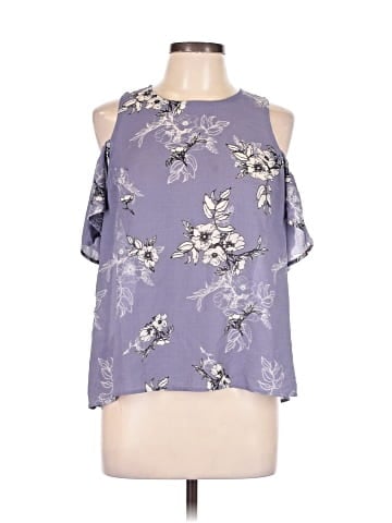 Rewind Sleeveless Blouse (view 1)