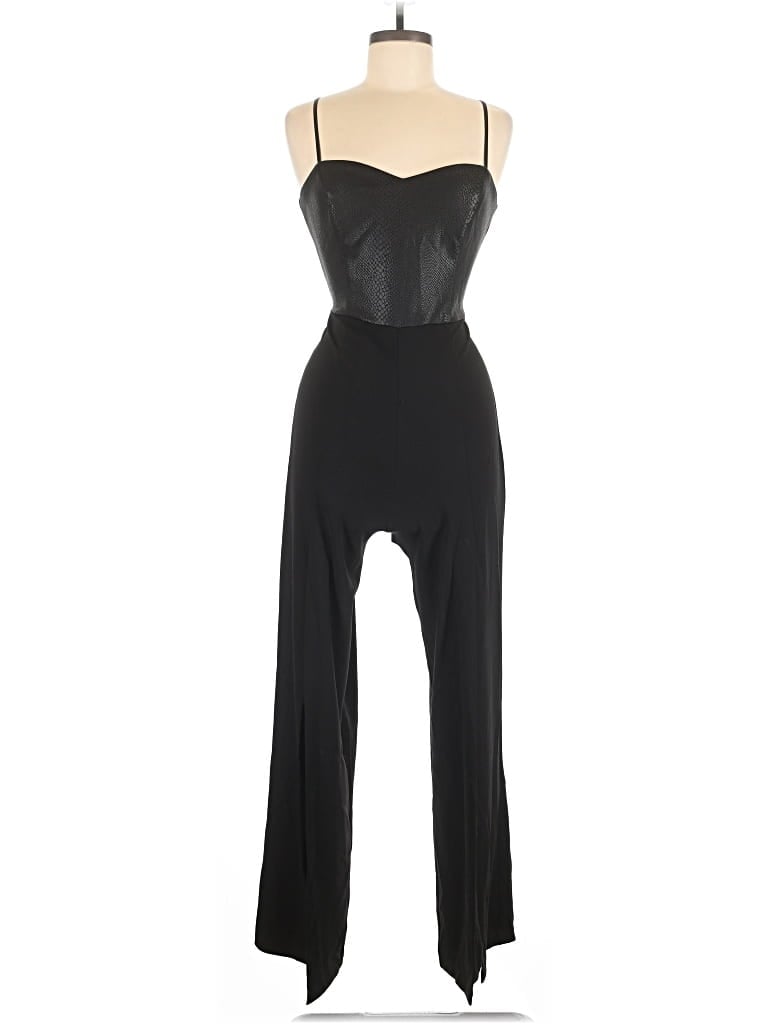 Pre-owned Bebe Jumpsuit In Black