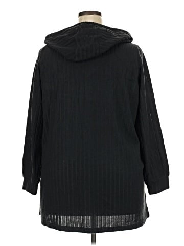 Woman Within Poncho (view 2)