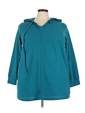 Woman Within Poncho (view 1)