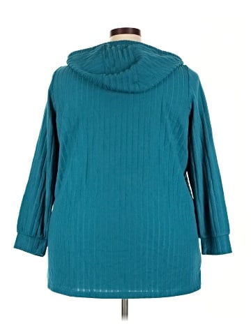 Woman Within Poncho (view 2)